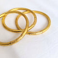 Buddhist bangle bracelet - gold
