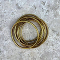Thin Buddhist bangle - antique gold
